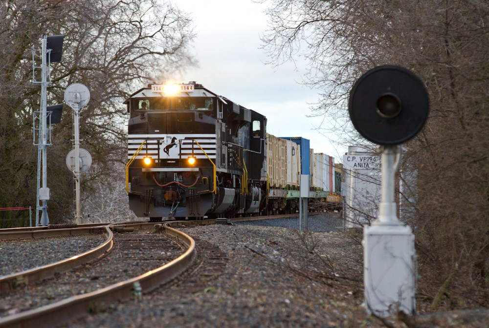 A pair of Norfolk Southern units lead a Union Pacific military train passed the north switch of the Anita Siding (north of Chico). A rare dwarf searchlight has since been removed. 
